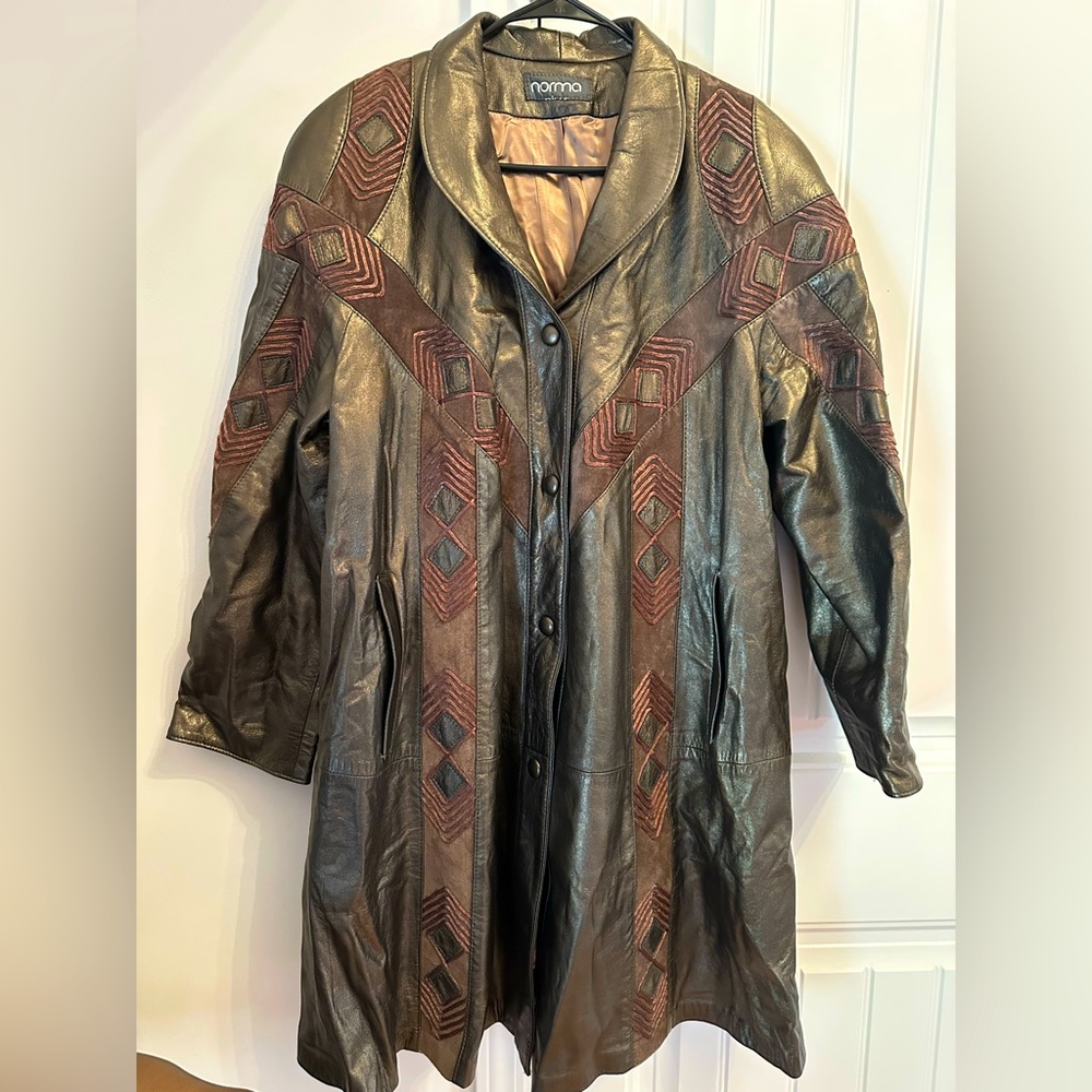 Genuine leather knee length coat by Norma (Canada).  Size M.